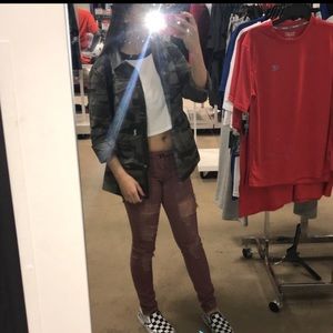 Jacket, crop top, and ripped jeans